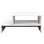 Table basse blanche avec une forme architecturale attrayante et une forme impressionnante de rangement