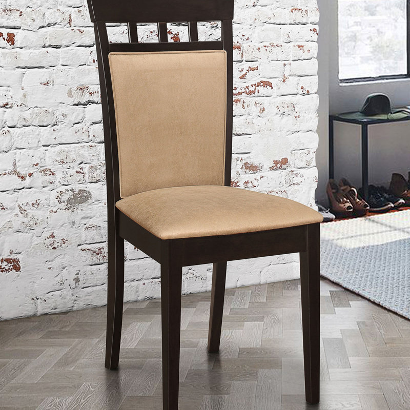 Ensemble de chaises de salle à manger élégantes avec dossier rembourré et design élégant, parfait pour tout espace repas.