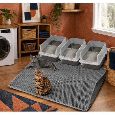 Sized at 47 x 33 in, this gray XL cat litter mat pairs a large double-layer honeycomb design with a soft litter-trapping surface; it is urine-proof and can be cleaned easily by rinsing with water.