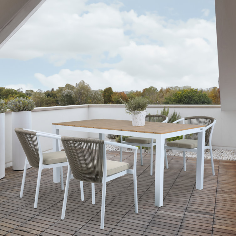 Moitoso Rectangular 4 - Person 160cm Long Dining Set with Cushions