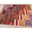 Tapis Kilim turc antique des années 1930, tissé à plat, à motifs géométriques multicolores, de style village, de 203 cm x 259 cm.