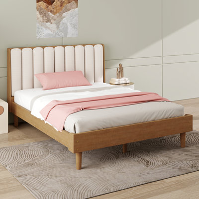Structure de lit en bois avec tête de lit tapissier de style piano, lit plateforme en bois massif