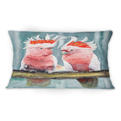 Coussin décoratif avec deux touffes roses et capitons