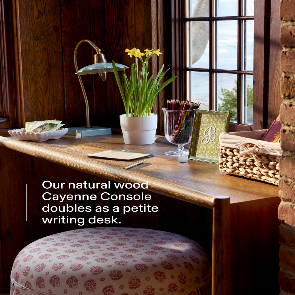 Our natural wood cayenne console doubles as a petite writing desk