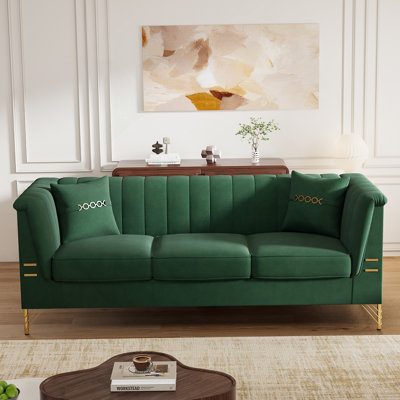 Canapé moderne en velours 3 places avec deux coussins Chesterfield, conçu pour le confort et l'élégance intemporelle du salon.