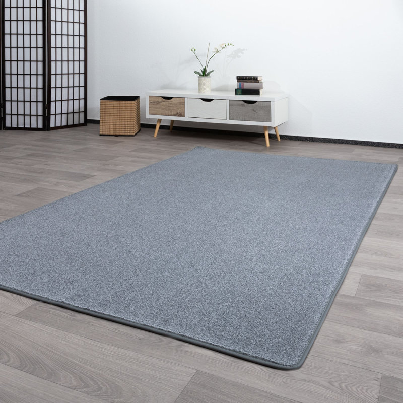 Jaakob Solid Colour Machine Woven Machine Tufted Area Rug, Rectangular 140 x 200cm