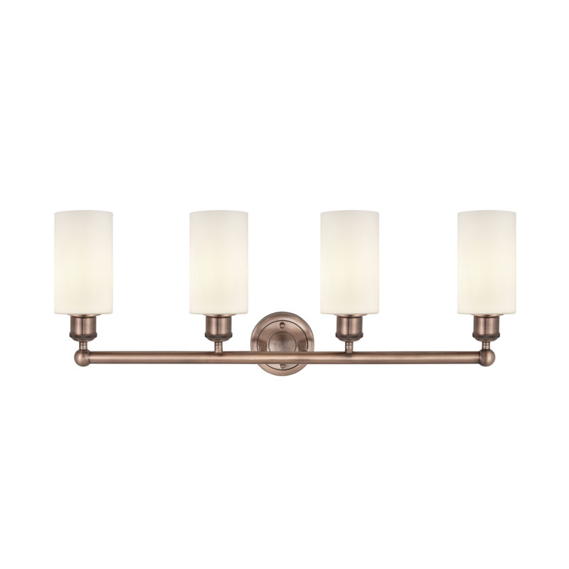 Éclairage pour meuble-lavabo à 4 lumières 30,875 pouces Caldello, Blanc mat, Cuivre antique