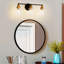 Luminaire de meuble-lavabo moderne à 3 lumières noir et bronze avec abat-jour en verre transparent