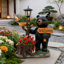 Figurine décorative d'extérieur en forme d'ours noir avec lanterne à énergie solaire