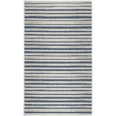 Tapis bleu Romelia