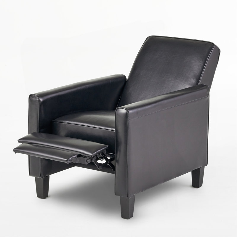 Fauteuil à dossier poussoir en cuir noir pour une décoration intérieure élégante