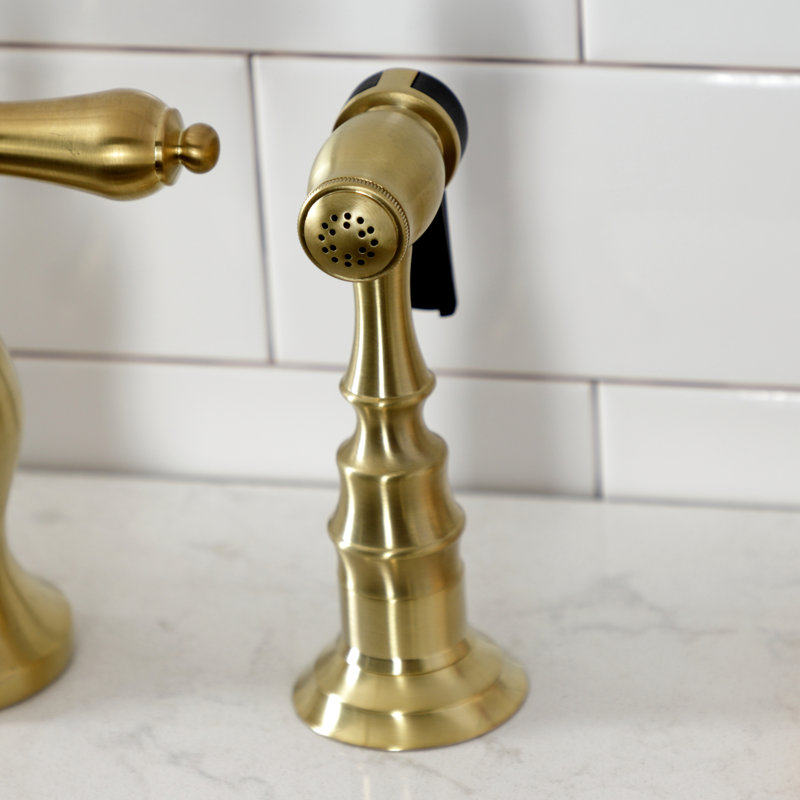 Kingston Brass Heirloom Two-Handle 3-Hole Deck Mount Bridge Kitchen Faucet with Brass Side Sprayer, Brushed Brass
