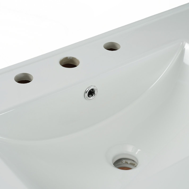 Meuble-lavabo de salle de bain avec lavabo en céramique et conception sans poignée pour les intérieurs modernes