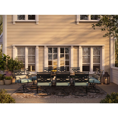 Canora Grey Elmfield 11-Piece Dining Set In Navy Blue With 10 Swivel Rockers And A 60-In. X 84-In. Table, 5C74CA1A6C894B8BBAA0F7B6E4E46603 by Canora Grey