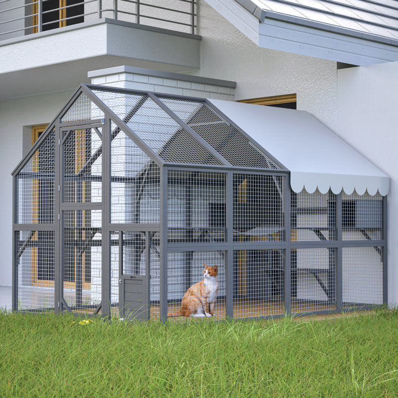 Maison d'extérieur pour chat avec protection solaire et lit à dosettes pour la détente des chats