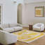 Alpha Hand Tufted Wool Area Rug in Yellow-128451157