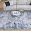 Tapis bleu clair à motif abstrait Baez-1827522874