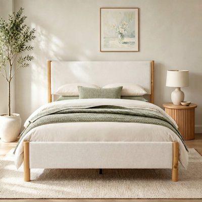 Structure de lit en chenille minimaliste avec pieds ronds en bois massif et lit plateforme silencieux