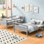 Lit superposé simple au-dessus d'un lit double gris, assurant la chambre à coucher avec lit, équipement de pointe