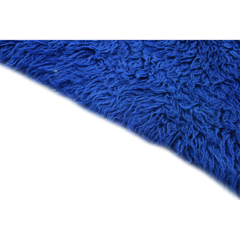 Tapis bleu Kalmanovitz