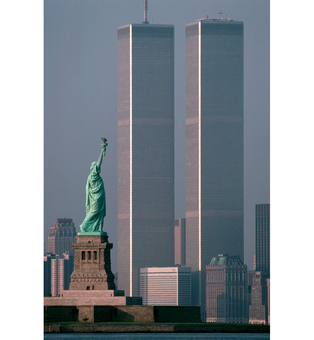 America Stands Tall World Trade Center and Statue of Liberty by Adam Woolfitty - Unframed Graphic Art Print on Paper Ebern Designs 