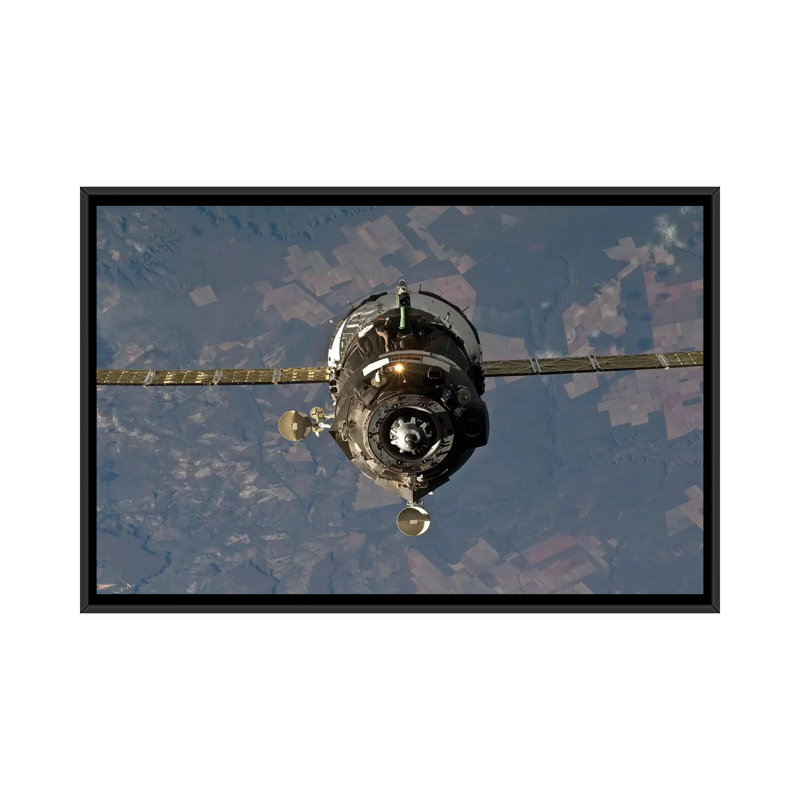 " The Soyuz TMA-19 Spacecraft " by Stocktrek Images, 18" H x 26" W x 1.5" D, Black Framed Canvas, No Mat