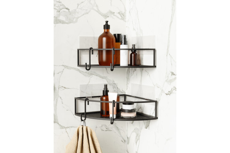 black corner shower caddies filled with shower supplies