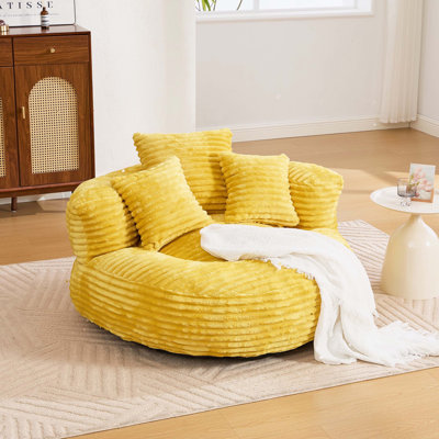 Fauteuil à billes surdimensionné en velours côtelé avec accoudoirs et coussins décoratifs