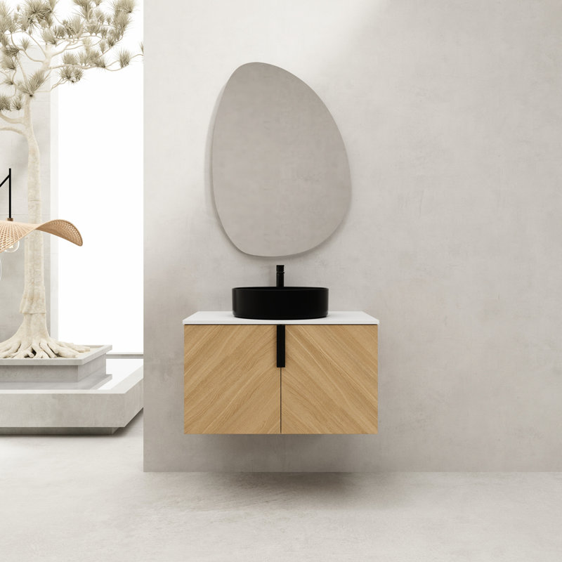 Meuble-lavabo contemporain de 76 cm (30 po) avec lavabo en céramique, charnières à fermeture amortie et poignées en métal.