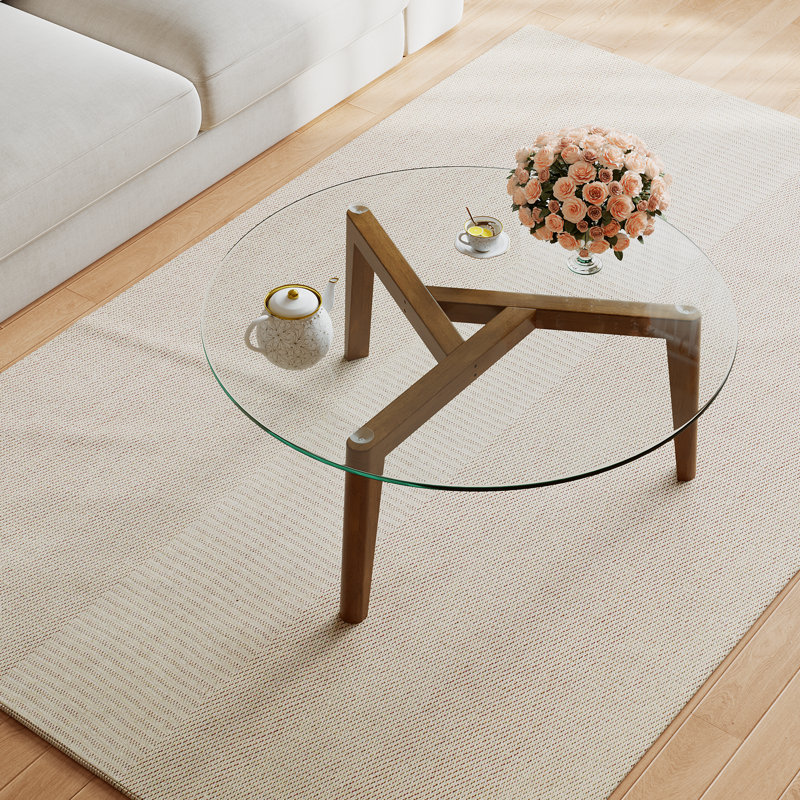 Table basse avec plateau en verre et structure en bois massif