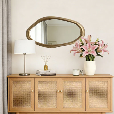 Elegant Wall Mirror with Curved Frame, Aged Gold Finish, Modern Accent Decor, 29.5"x15.25"