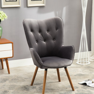 Élégante chaise d'appoint en velours gris avec dossier et pieds en bois massif