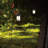 Set of 2 Brown and White Solar-Powered Hanging Lanterns with Shepherd Hooks