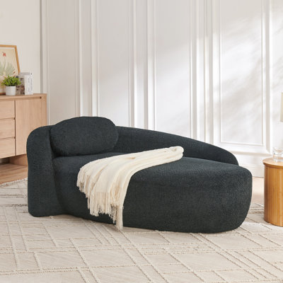 Canapé-lit moderne simple ovale avec dossier intégré, accoudoir latéral et coussin pour espaces de vie compacts