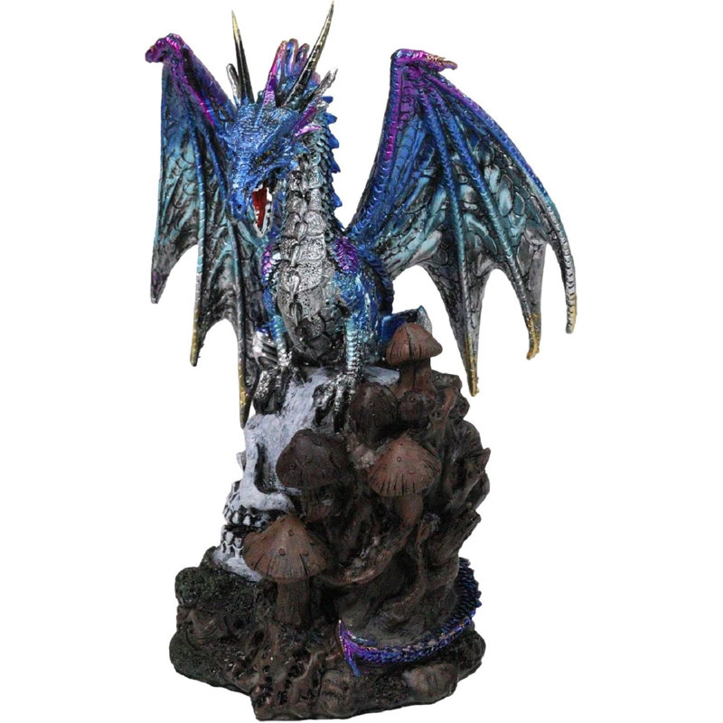 Figurine de dragon bleu métallique avec des pointes mauves perchées sur un crâne surdimensionné