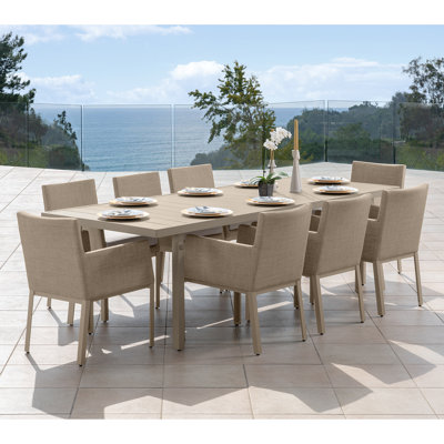 Santrez Rectangular 8 Person 105" Long Dining Set With Sunbrella Cushion Covers
