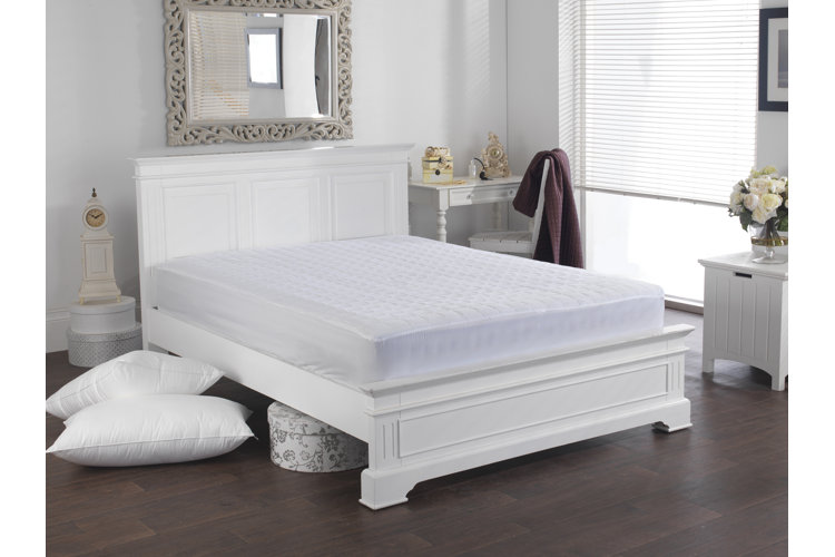 Bedroom with mattress protector