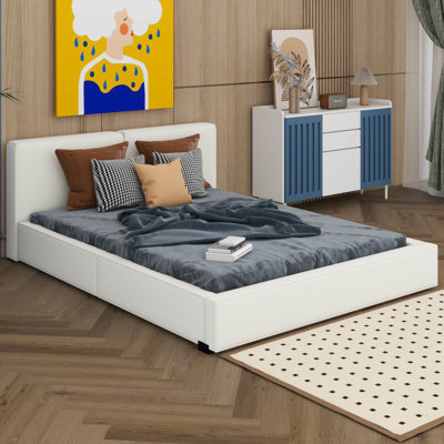 Grand lit tapissier avec base solide