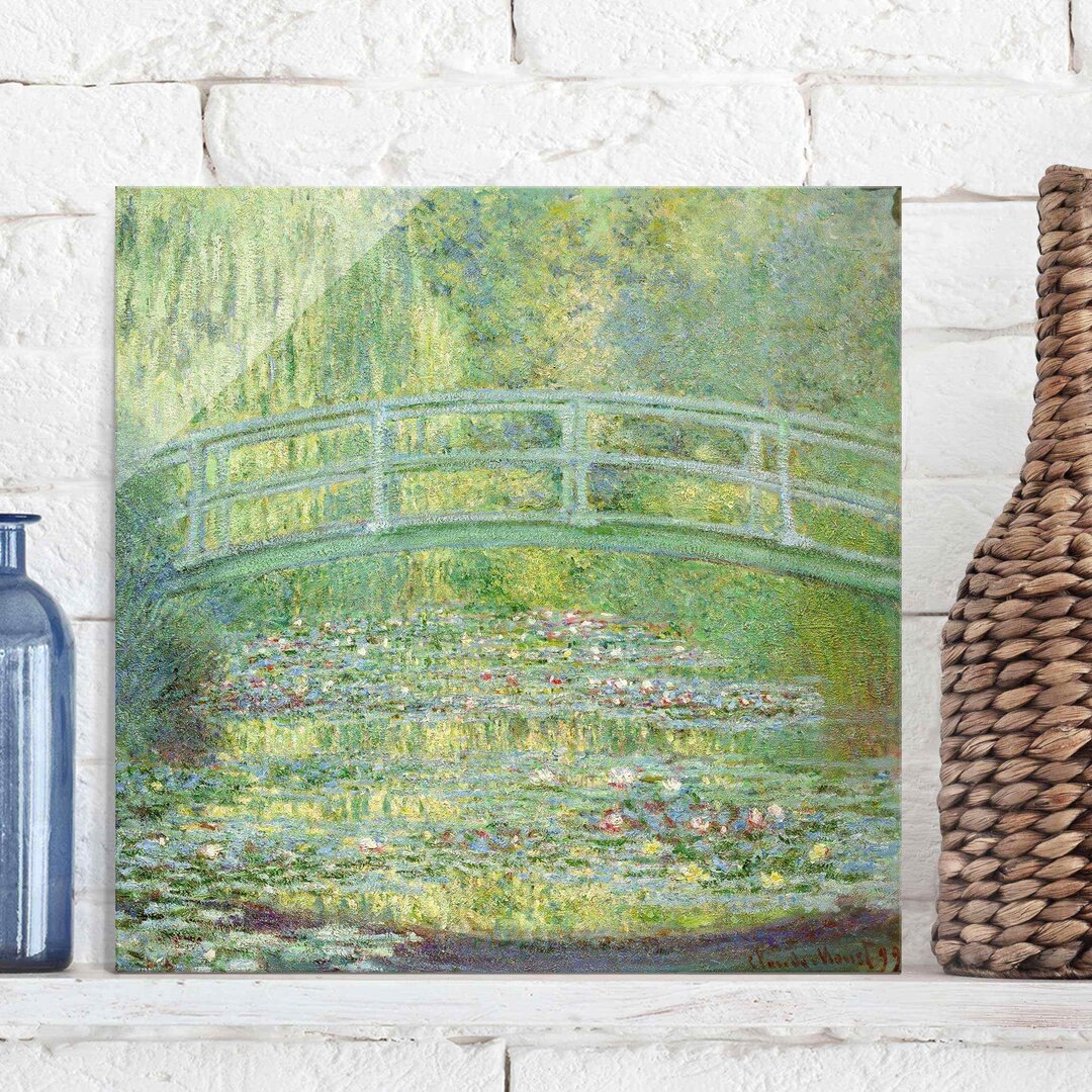 Glasbild Seerosenteich und japanische Brücke von Claude Monet