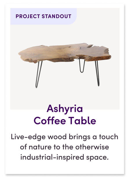 Holdridge Coffee Table Live-edge wood brings a touch of nature to the otherwise industrial-inspired space.