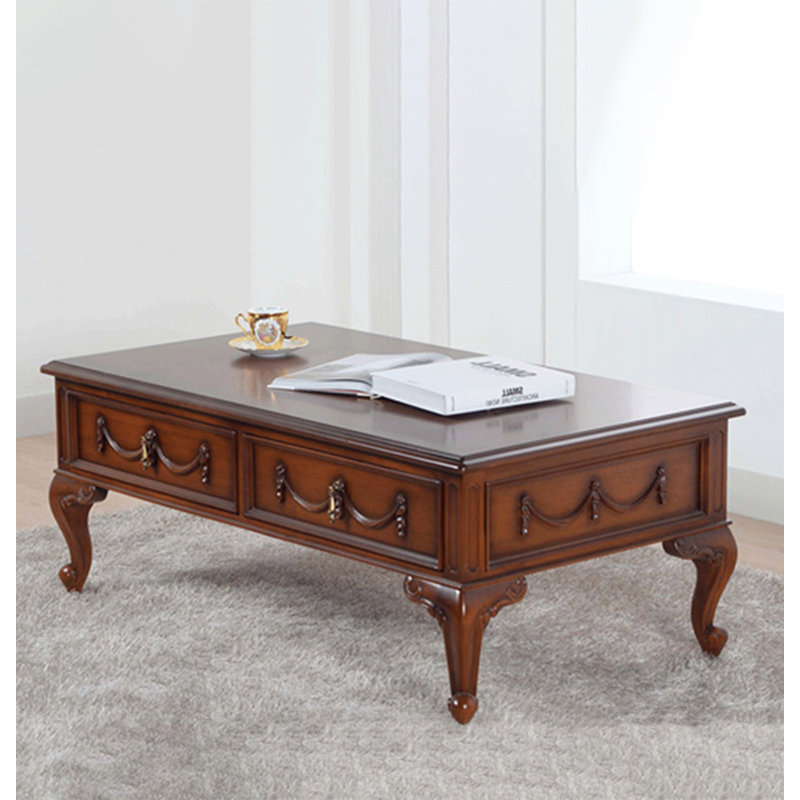 Carved mahogany coffee table