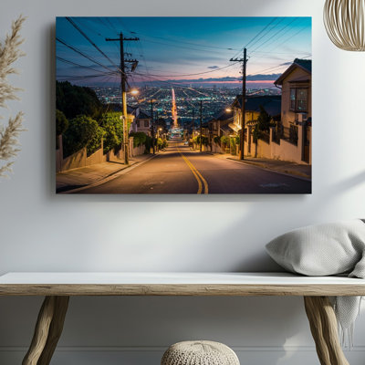 Canvas A Serene Urban Street Scene Captured At Twilight Featuring A Wall Art Winding Road Leading Downhill Flanked By Traditional Canvas Wall Art