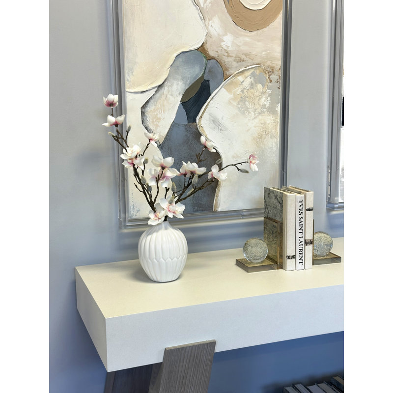 Centre de table magnolia dans un vase