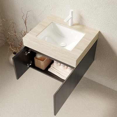 Meuble-lavabo flottant avec comptoir en pierre frittée, cuve en céramique, armoire en contreplaqué, portes à fermeture en douceur et trou de robinet pré-percé pour une installation sans effort.