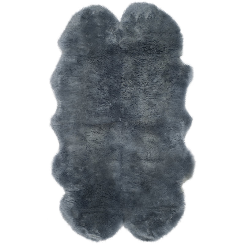 Tapis bleu acier Tateos, Rectangle 5 pi 5 po x 7 pi 7 po