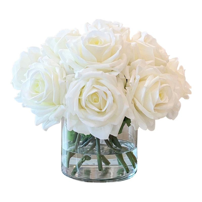 Grand arrangement floral dans un vase en verre
