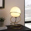 Lampe de table, globe en verre blanc, base 4 anneaux en spirale 14 po