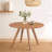 Temi Dining Table | 47" Round Top | Handmade Natural Brown Solid Mango Wood | Angled Four Legged Base