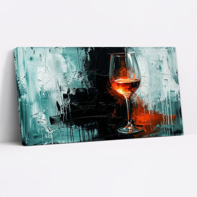 Tableau mural sur toile représentant un verre à vin ambré sur fond turquoise et noir abstrait