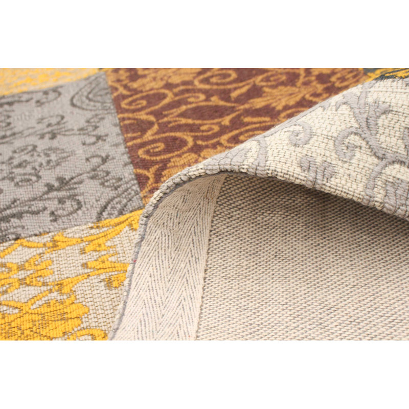 Tapis jaune géométrique noué à la main